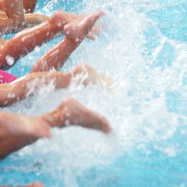 kids kicking in the water